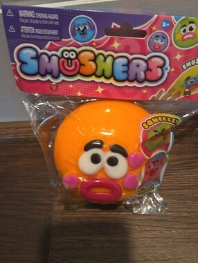 Smushers ORB Orange Squishy Smusher Face